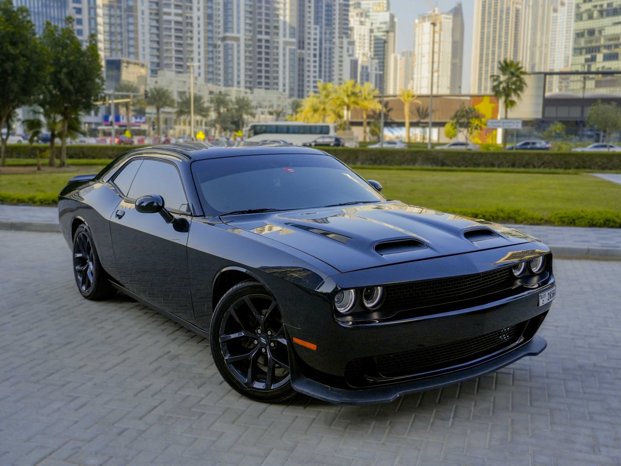 https://dev.quickdrive.ae/uploads/2023/02/01/Dodge Challenger V6 2021 (1).jpg